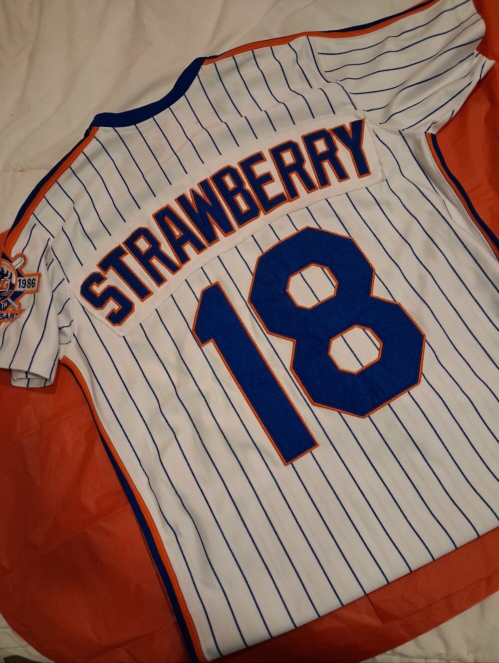 White Pinstripe Baseball Jersey with Blue & Orange Trim - Strawberry 18